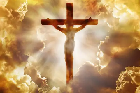 Christi Himmelfahrt: Jesus am Kreuz, umgeben von strahlenden Wolken. Ein biblisches Bild der Erlösung.